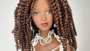 photo du visage de la poupée Alex afro-américaine de Madame Alexander
