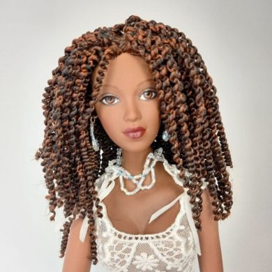 photo du visage de la poupée Alex afro-américaine de Madame Alexander