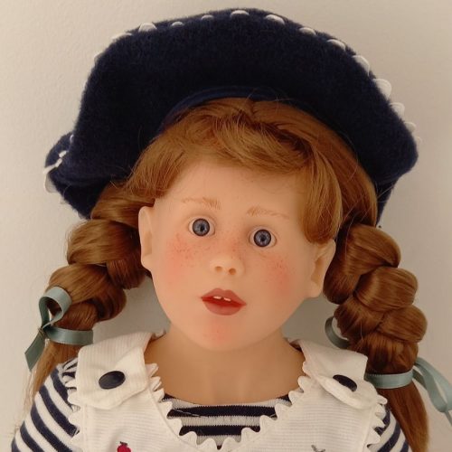 Photo du visage de la poupée Lili au Mont Saint Michel de Malou Ancelin pour Corolle